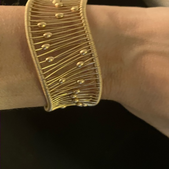 Designer gold bracelet balls move up and down the bracelet with wrist. - Picture 5 of 6